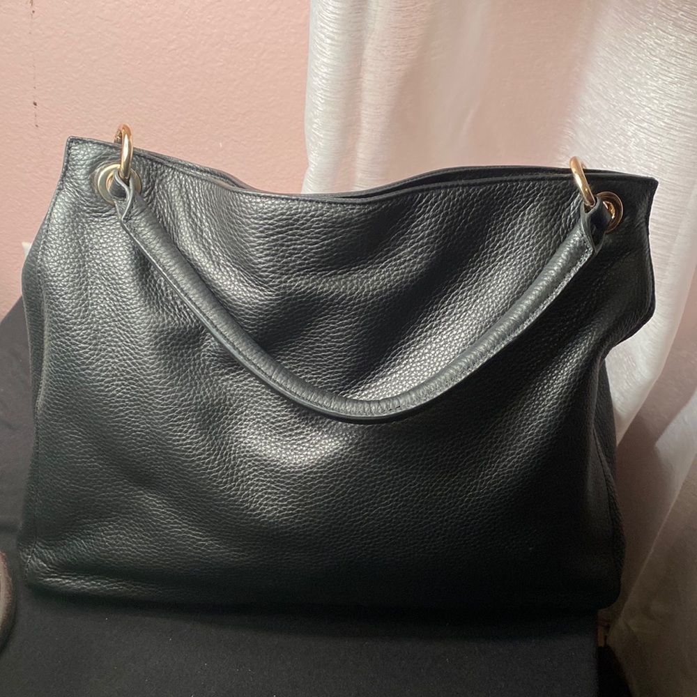 Mark and graham black leather handbag , brand new never used. Medium size bag.